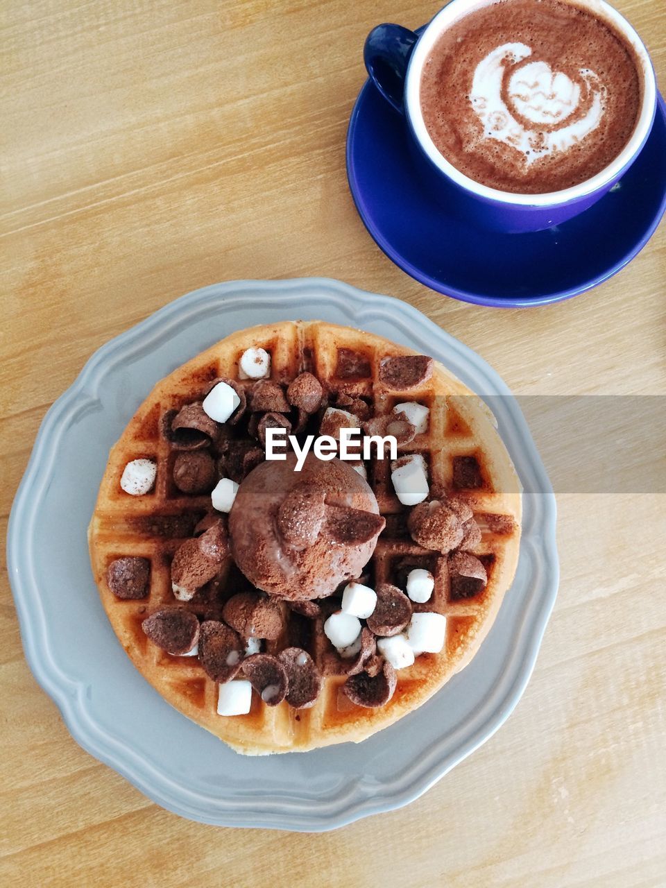 Close-up high angle view of coffee and dessert on table