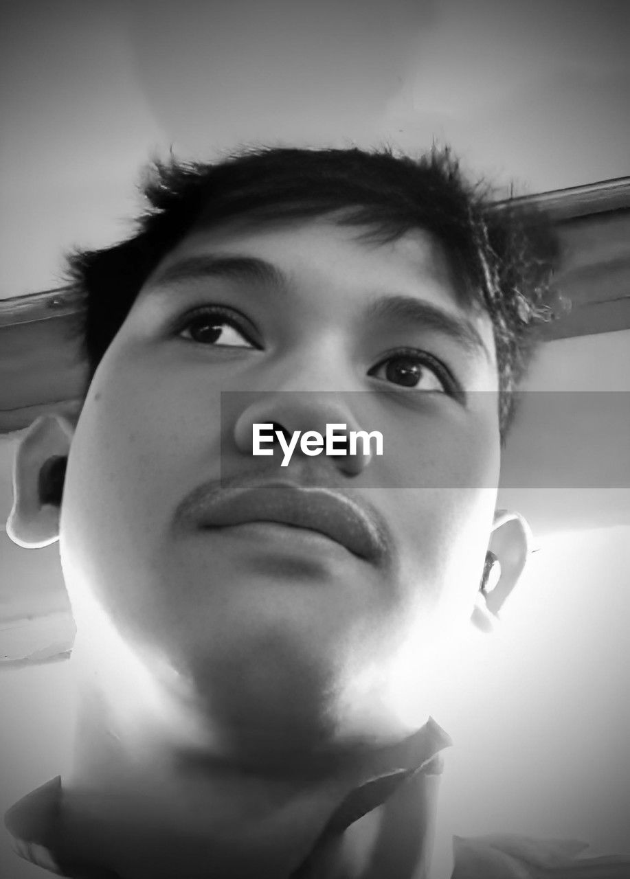 black, white, portrait, human face, one person, close-up, black and white, portrait photography, headshot, skin, human head, monochrome, human eye, person, monochrome photography, young adult, adult, looking at camera, men, smiling, female, front view, indoors, emotion, nose, child, human mouth, lifestyles, photo shoot, looking, human hair, low angle view, nature, looking up