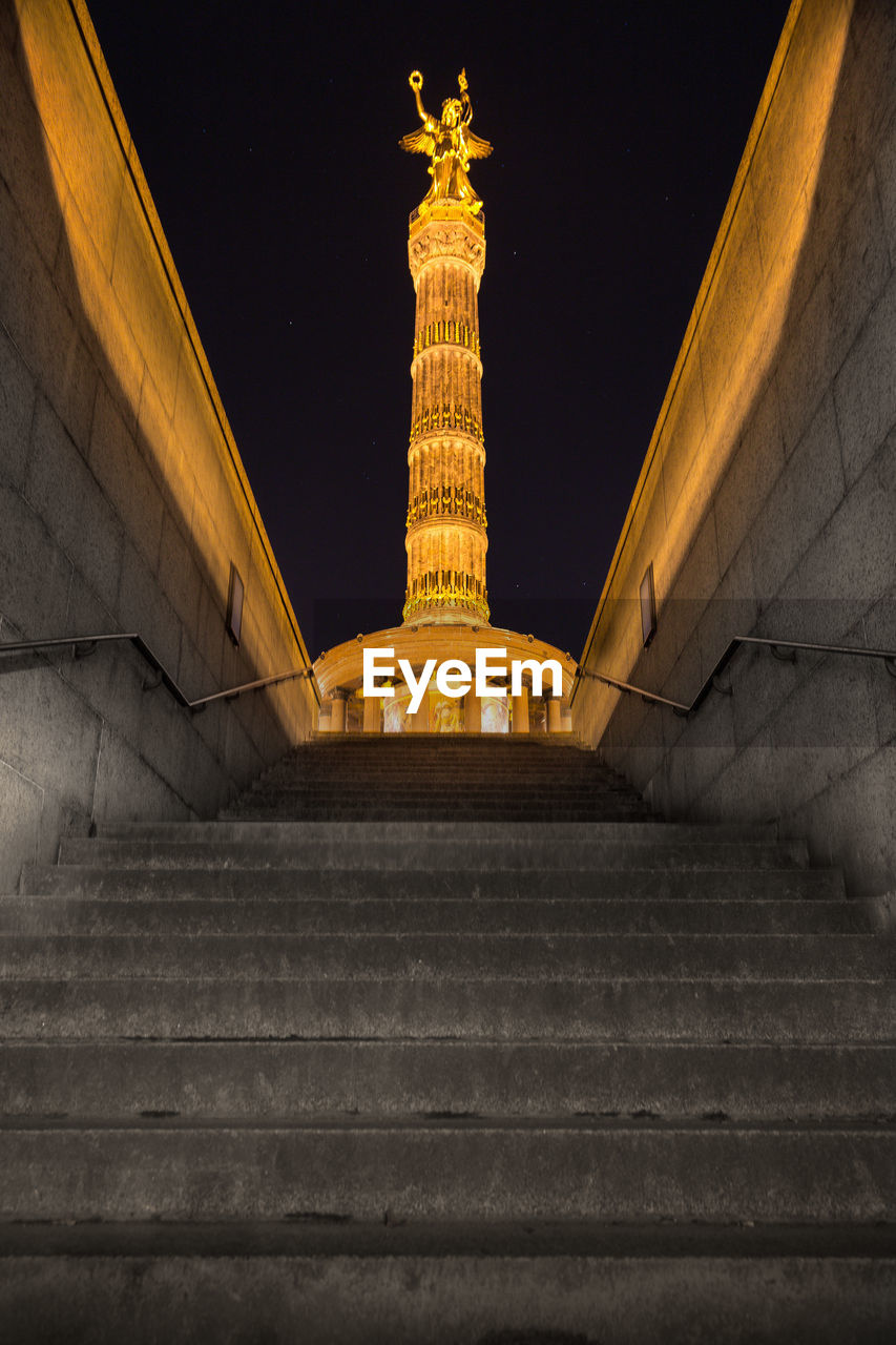 Low angle view of statue at night