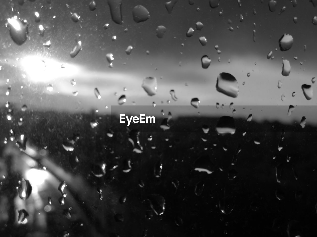 FULL FRAME SHOT OF SKY SEEN THROUGH WINDSHIELD AGAINST THE BACKGROUND