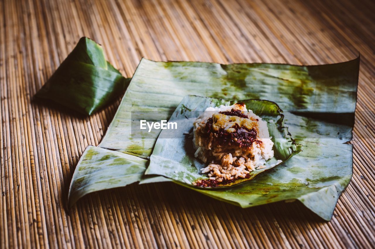 Close-up of rice served on banana leaves