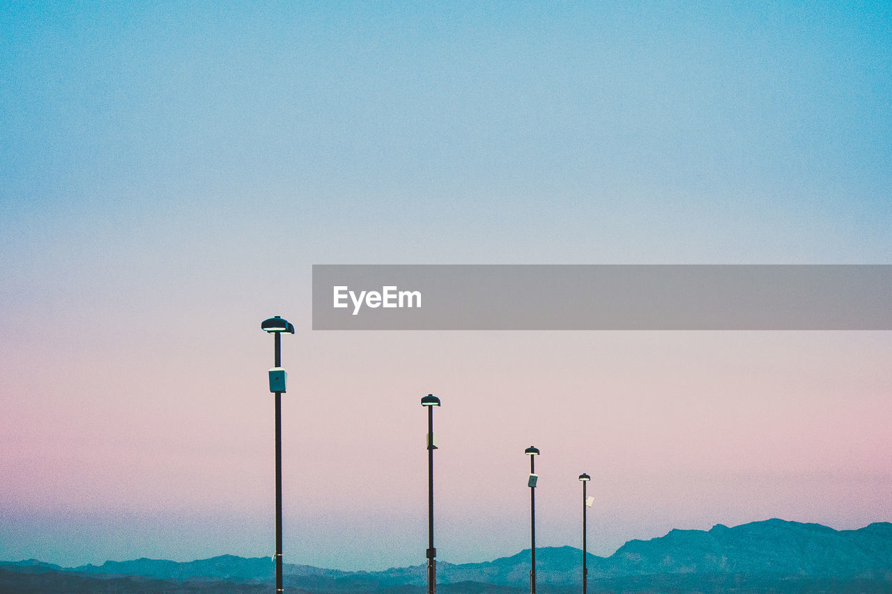 Street light against clear sky