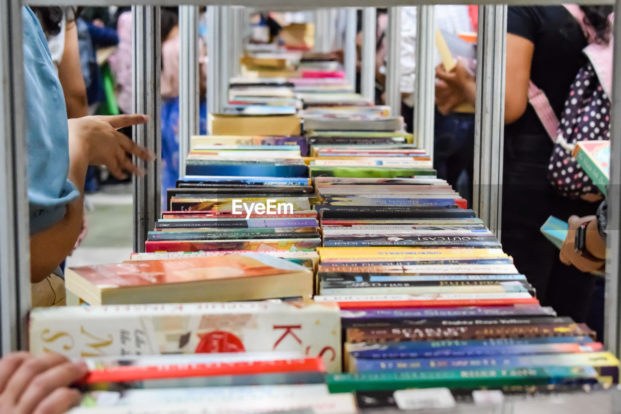 New delhi, india, september 09 2023 - variety of books on shelf inside a book-stall at delhi, india