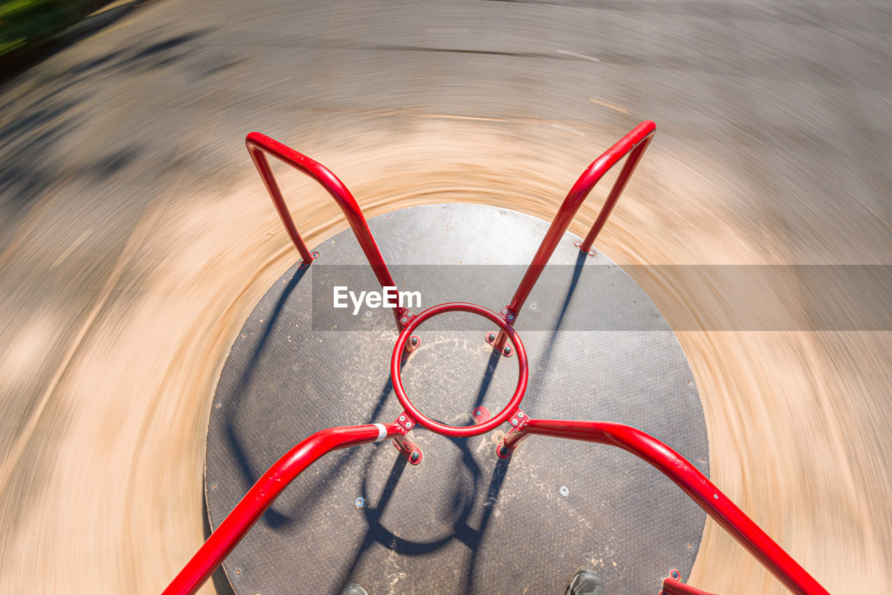 HIGH ANGLE VIEW OF EYEGLASSES ON CHAIR AGAINST WATER