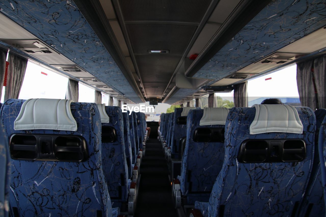 VIEW OF TRAIN PASSING THROUGH BUS