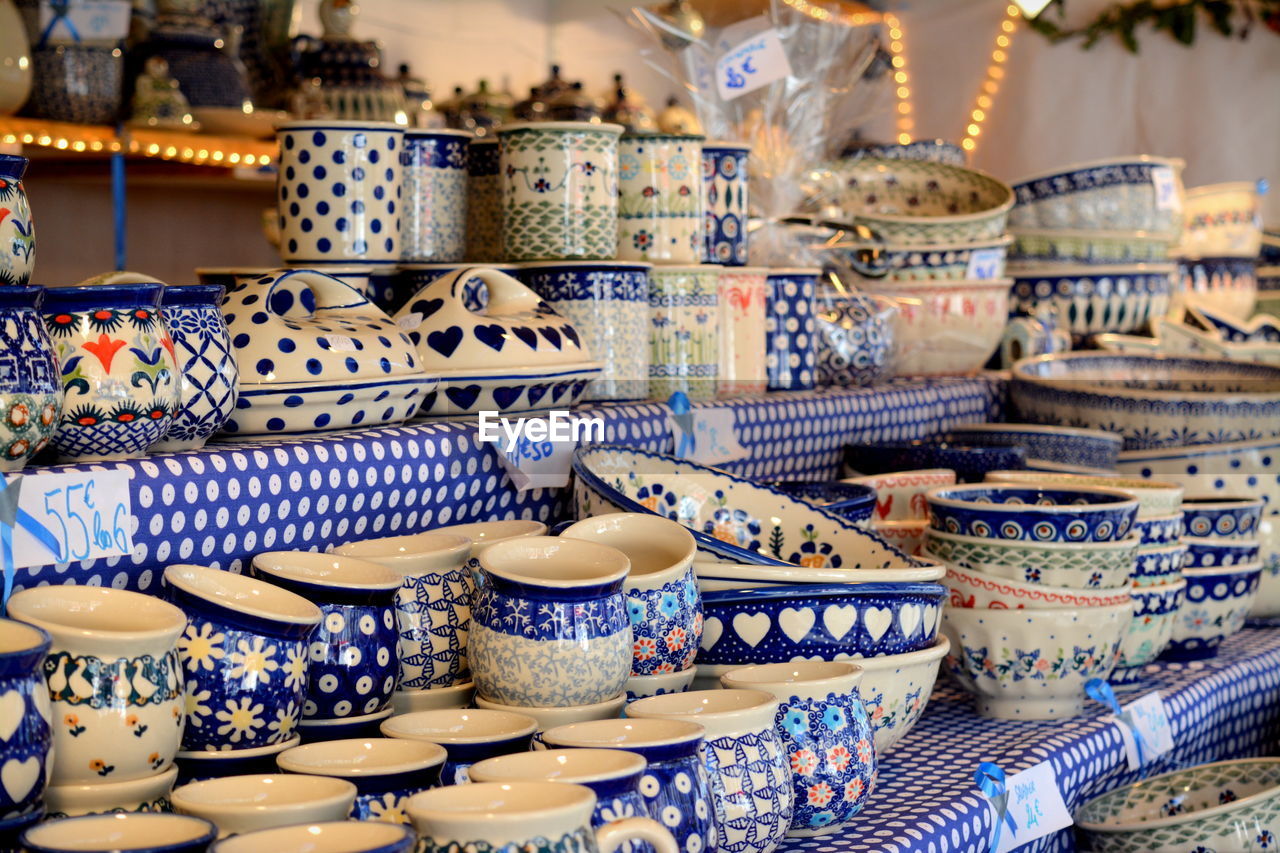 Close-up of various ceramics for sale in market