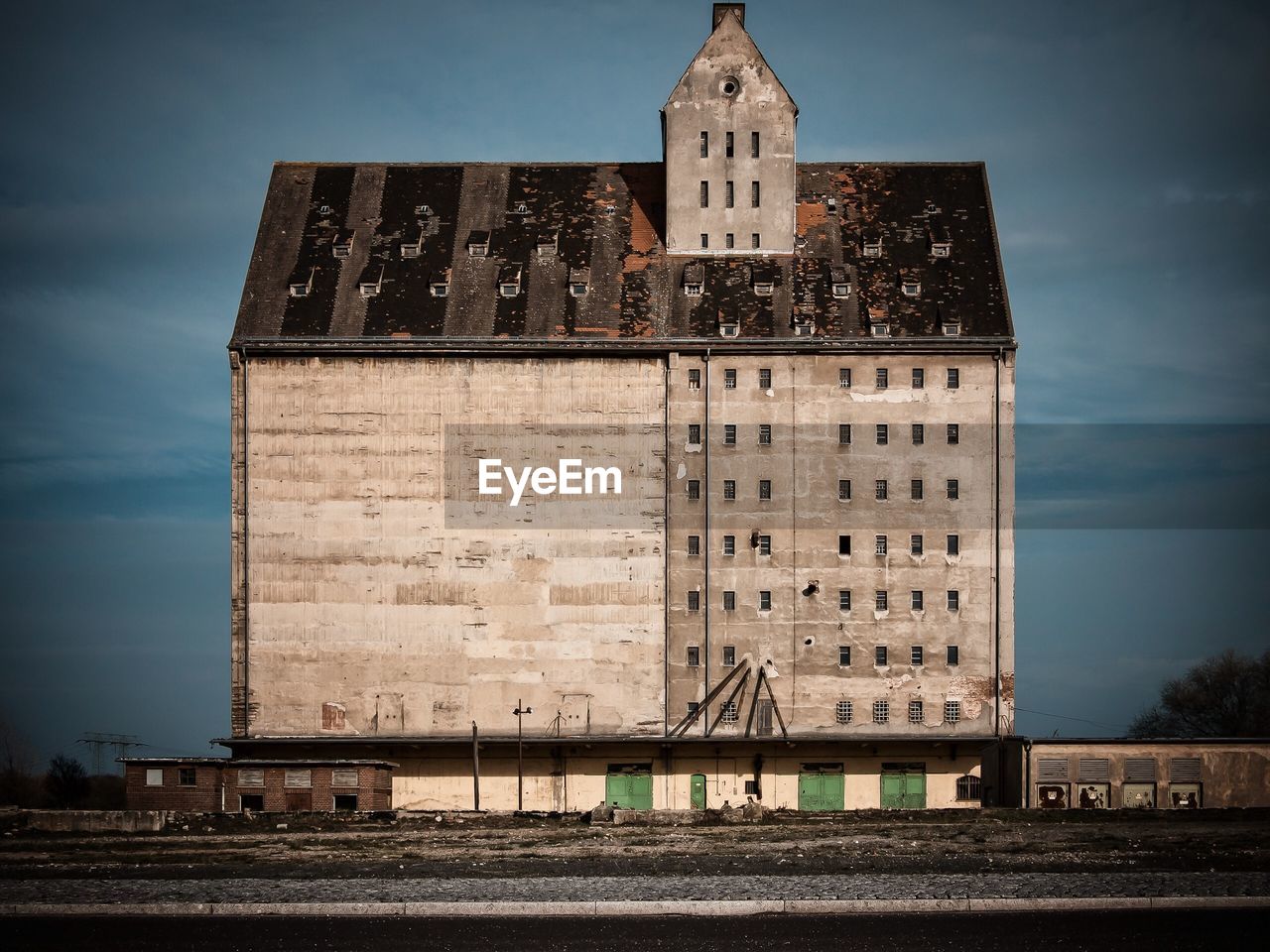 View of building against cloudy sky