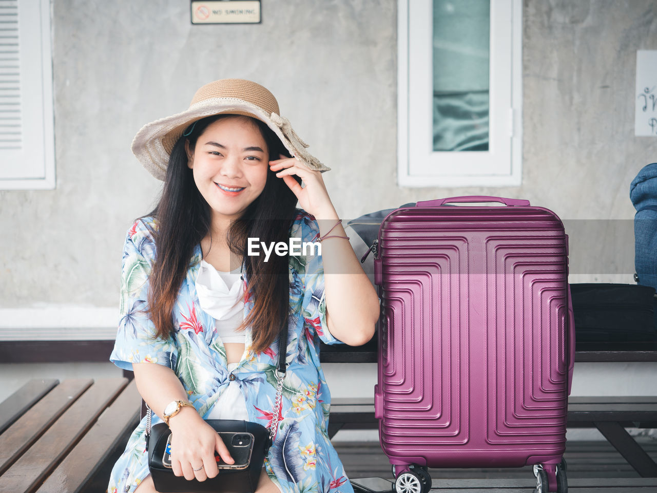 Travel concept from young asian woman in summer clothes smiling cheerful and happy.