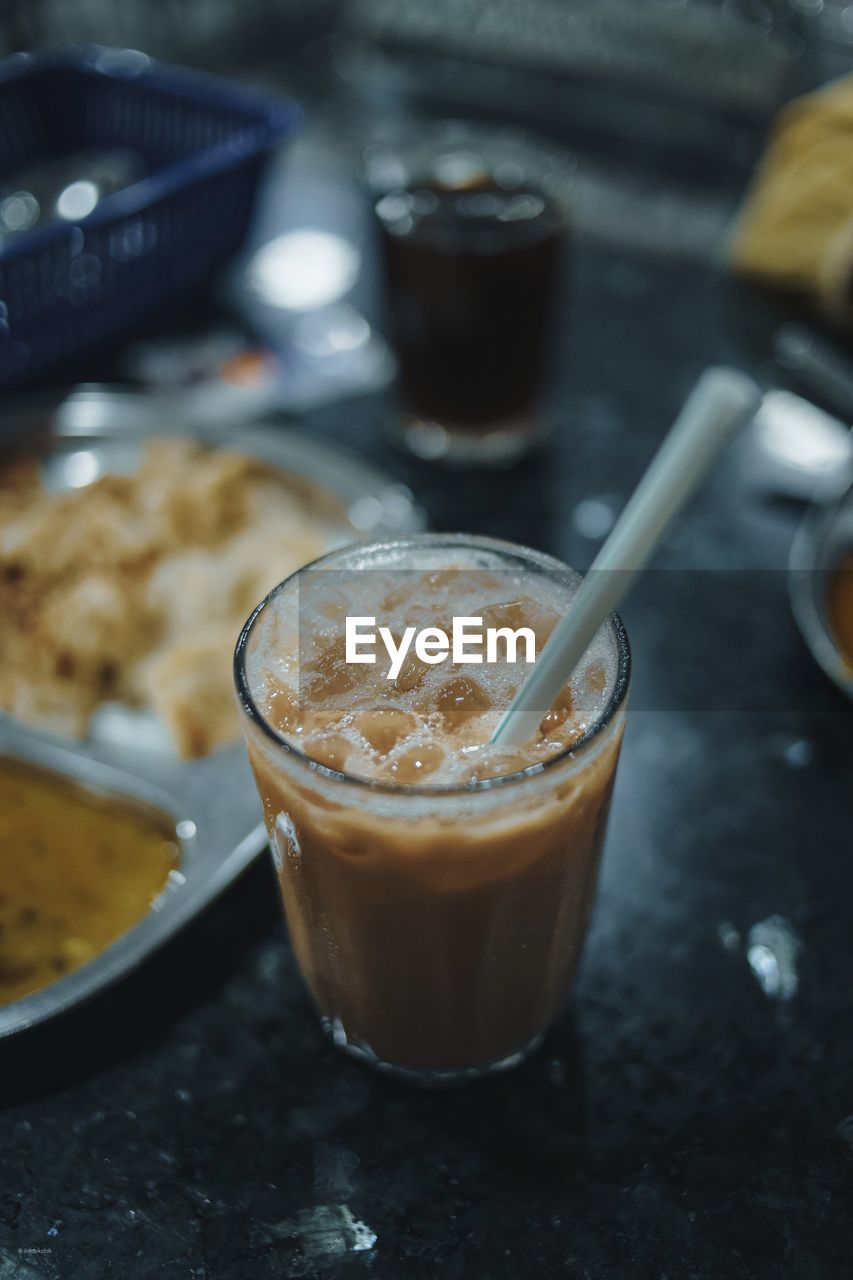 Close-up of iced coffee on table