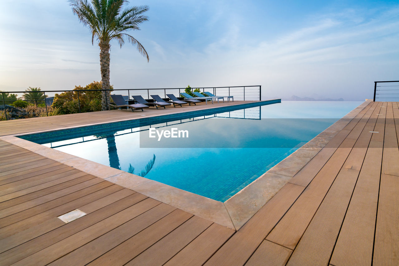 Infinity pool in a resort of arabian desert. luxury resort in oman. 