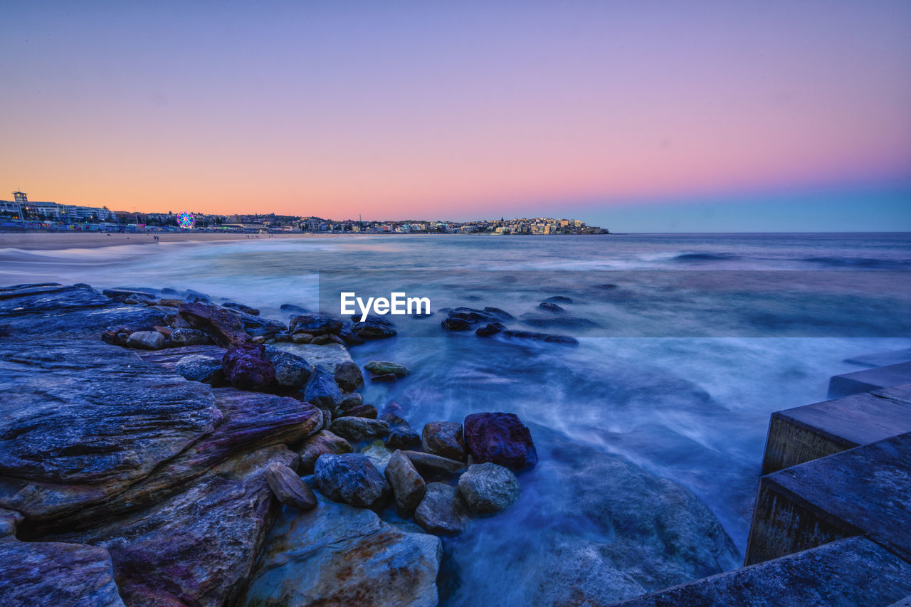 Scenic view of sea against sky during sunset