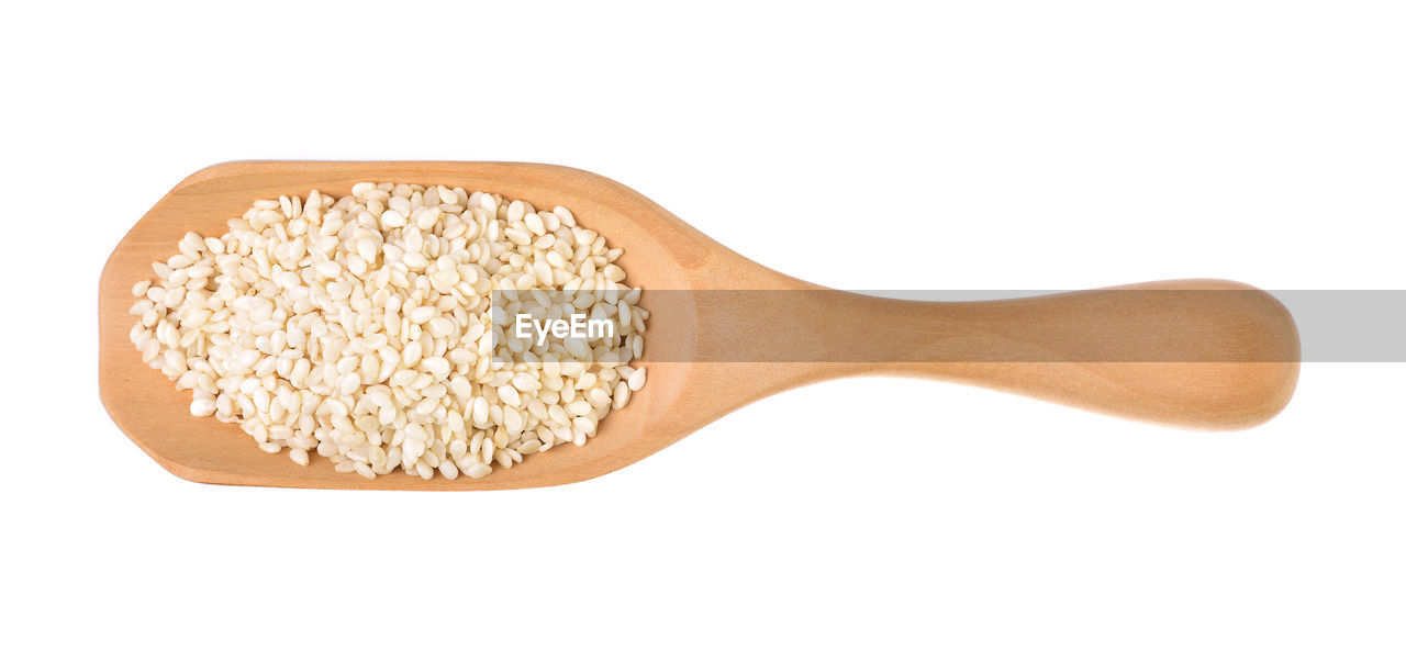 white background, studio shot, food, cut out, food and drink, cereal plant, wellbeing, kitchen utensil, spoon, wooden spoon, healthy eating, wood, indoors, food grain, seed, no people, ingredient, tool, raw food, plant, freshness, eating utensil, single object