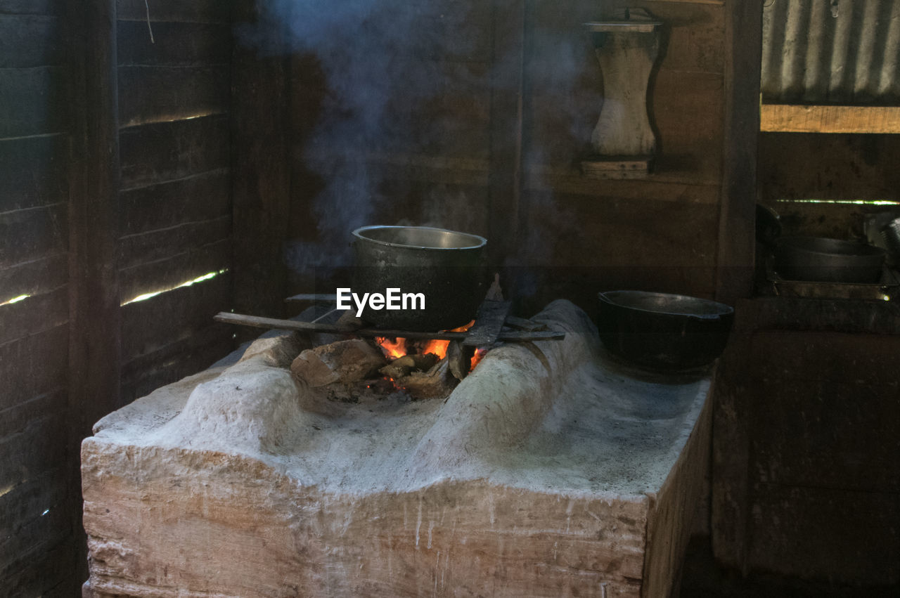 Container on wood burning stove