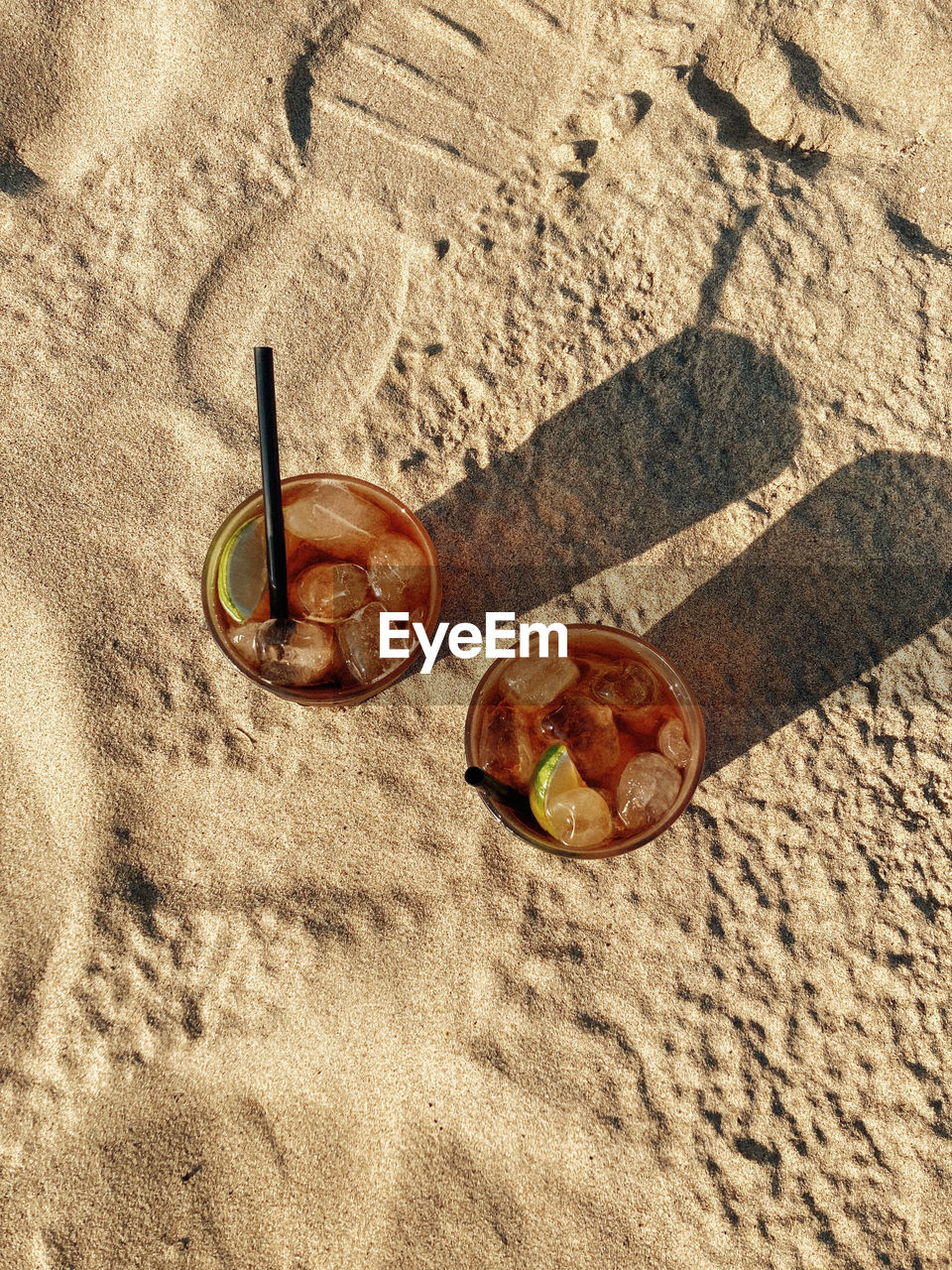 sand, beach, land, high angle view, sunlight, nature, day, shadow, no people, outdoors, still life, shell, leaf, holiday, wood