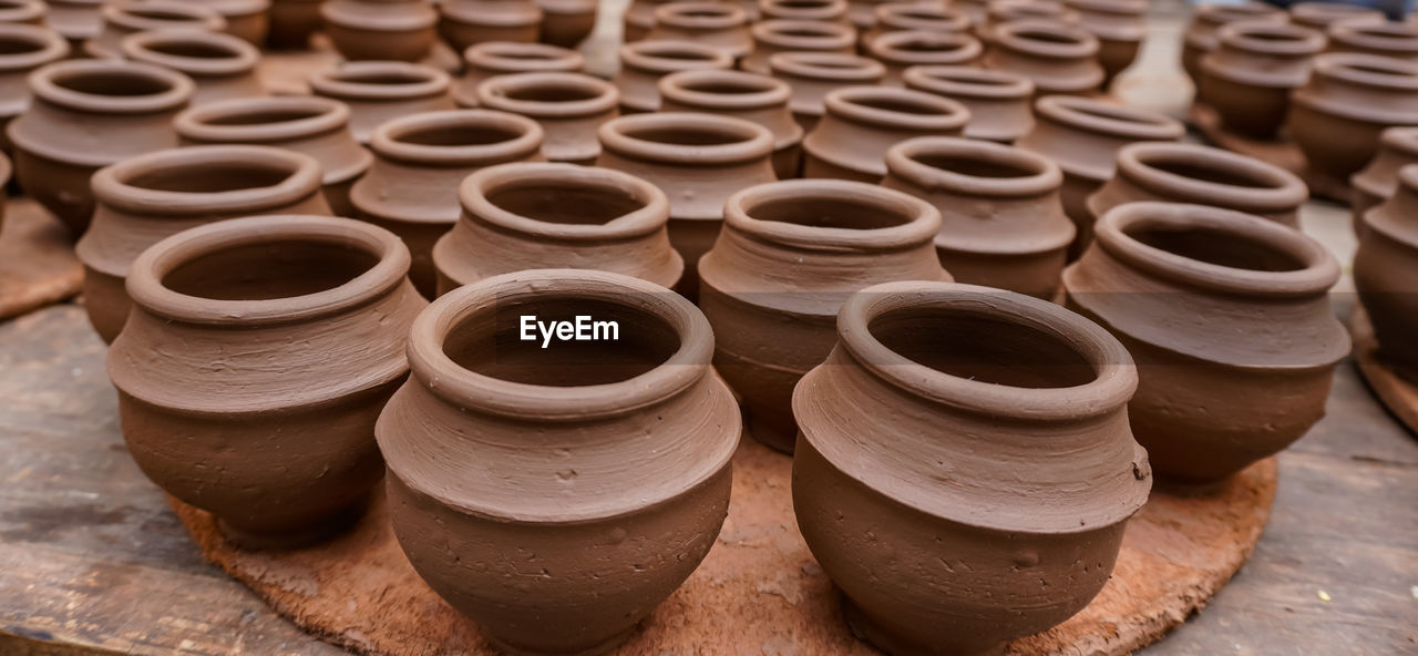 High angle view of earthen pots for sale at market