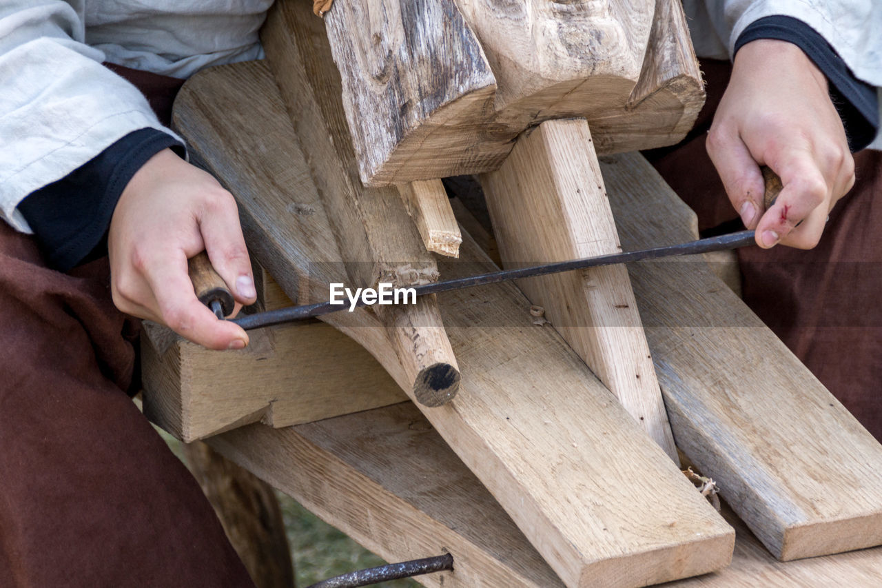 High angle view of person doing carpentry