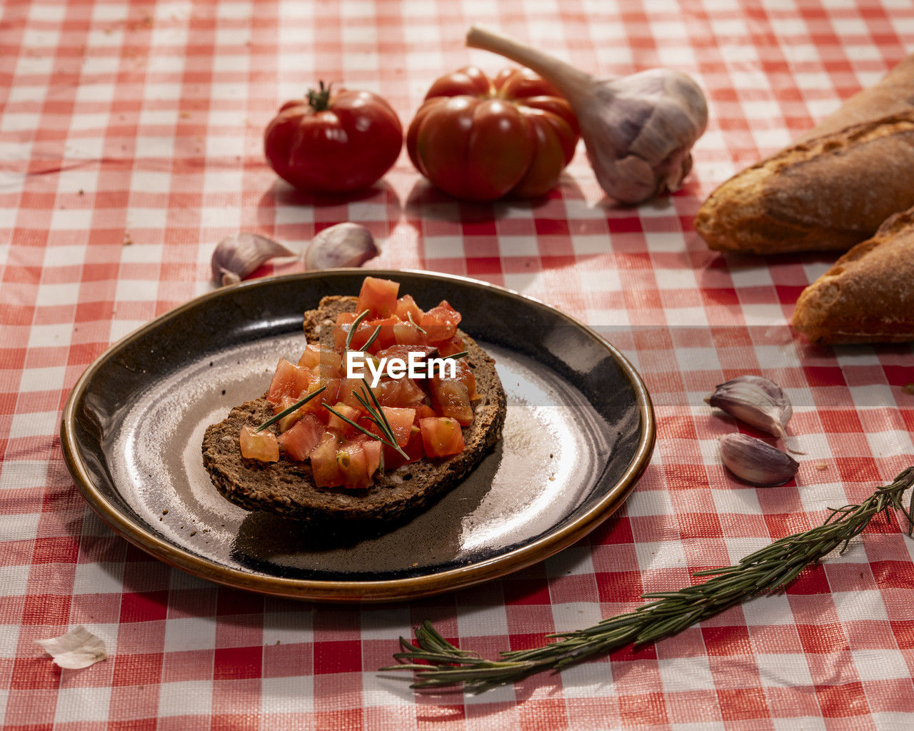 food and drink, food, checked pattern, tablecloth, healthy eating, produce, freshness, plate, dish, no people, fruit, vegetable, kitchen utensil, wellbeing, indoors, meal, eating utensil, meat, studio shot, table, breakfast, still life, dish towel, tomato, household equipment, high angle view, red