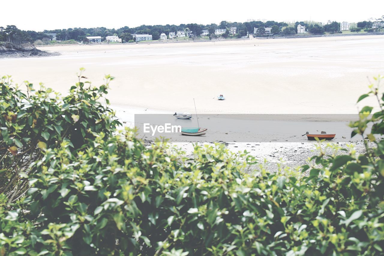 BOATS IN RIVER