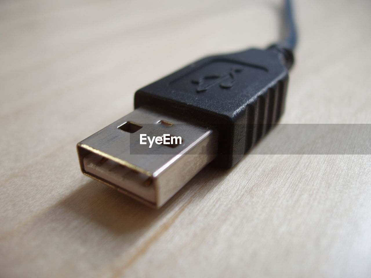 Close-up of usb cable on table