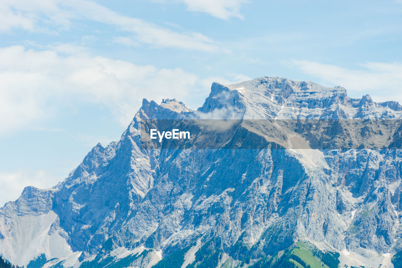 Scenic view of the german mountain zugspitze against sky