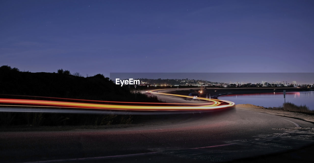 Light trails on road at night