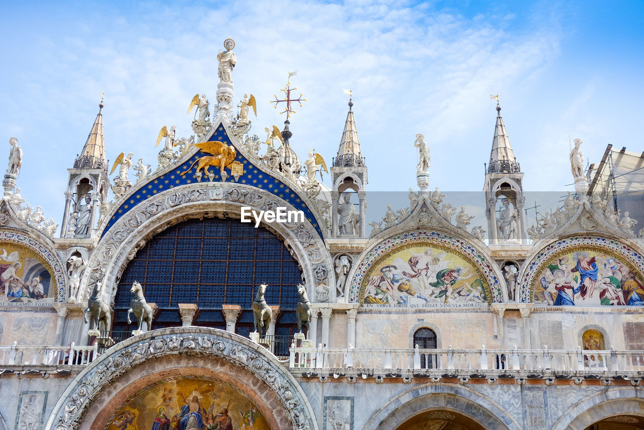 Low angle view of st mark basilica against sky in city
