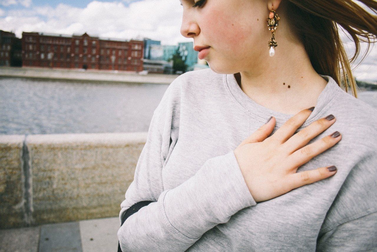 Close-up mid section of a beautiful serious young woman