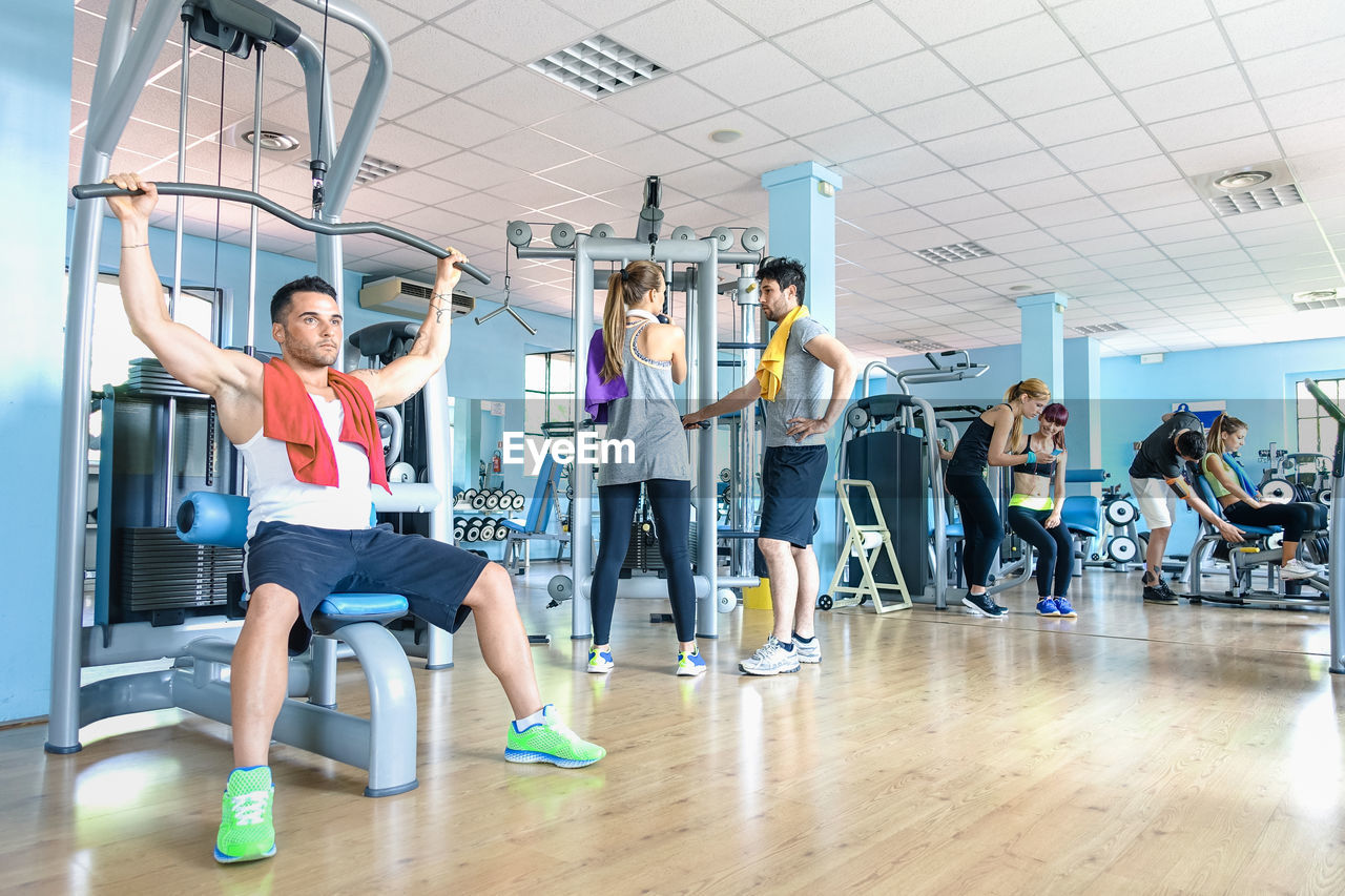 People exercising at gym