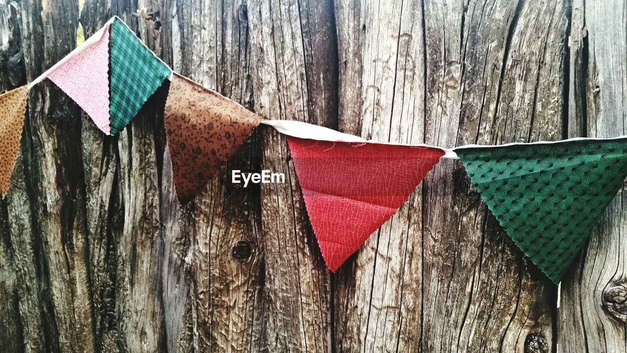 Close-up of bunting on wood