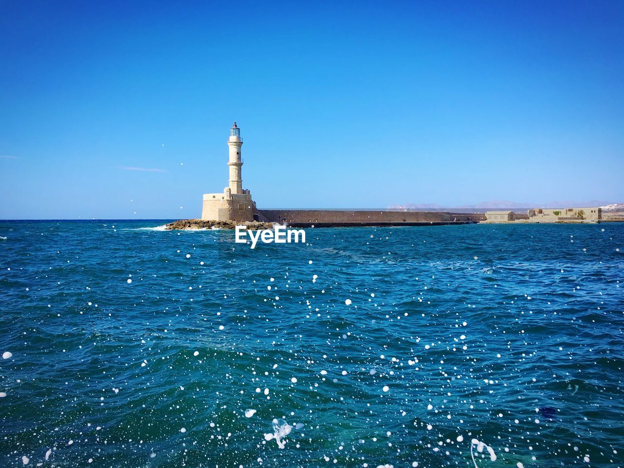 Scenic view of sea against clear sky