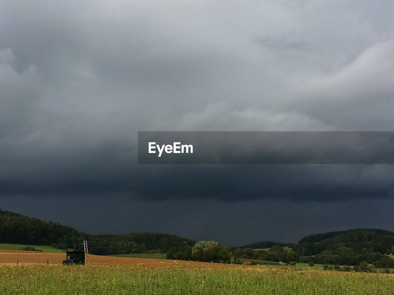 Cloudscape over agricultural field