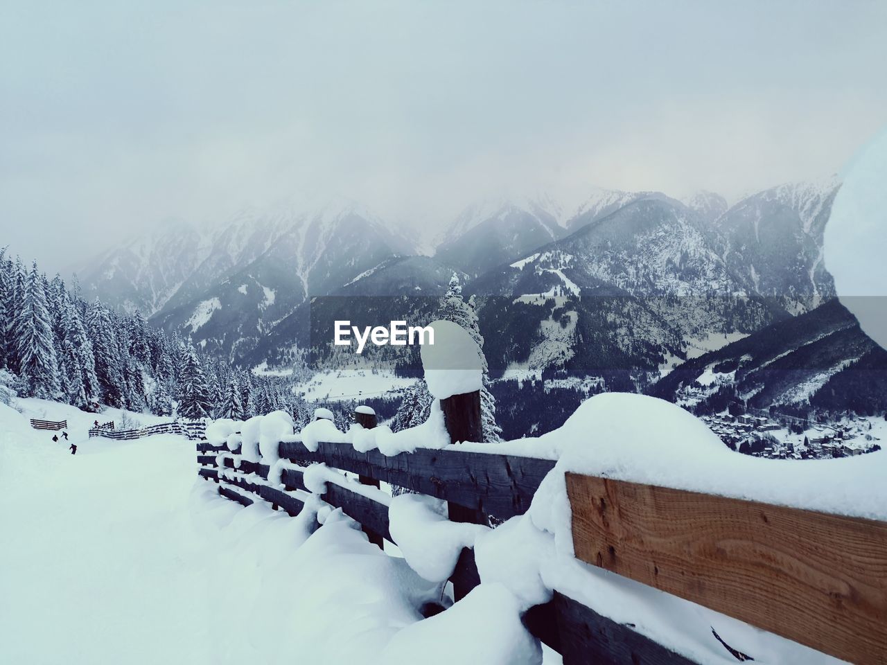 Snow covered mountains against sky