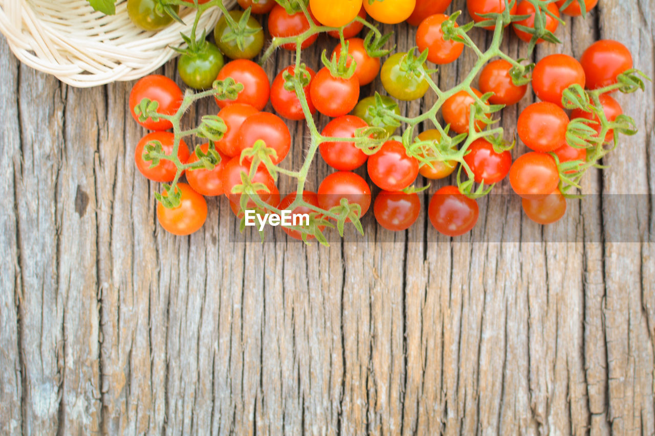 Close-up of cherry tomatoes on wooden table