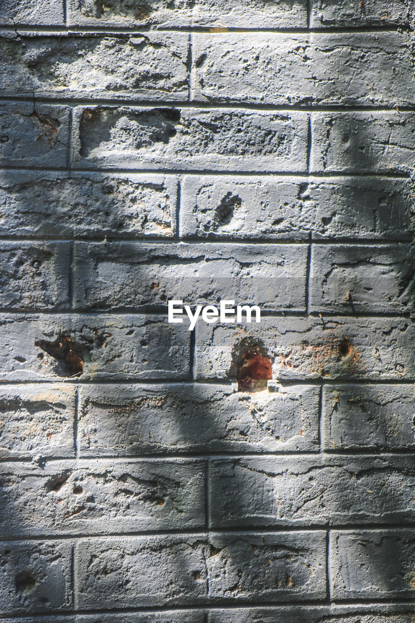 CLOSE-UP OF WEATHERED WALL