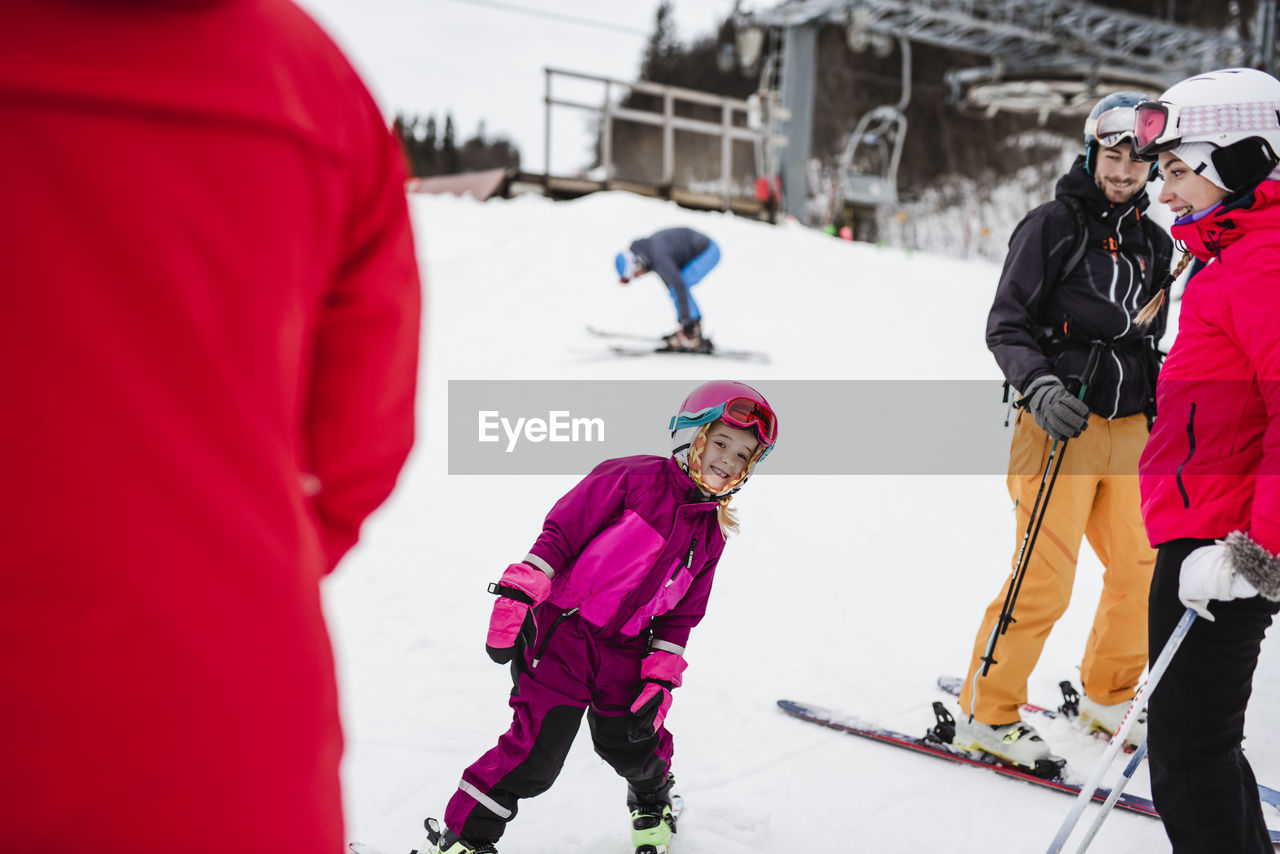 Skiing girl on slope