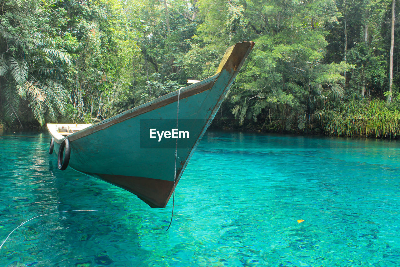 Boat in lake labuan cermin, indonesia