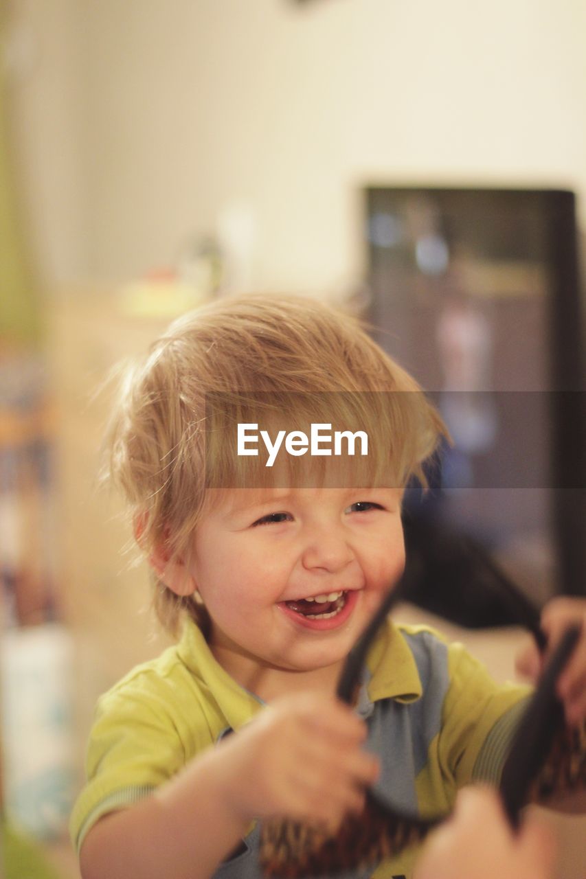 Cute smiling boy at home