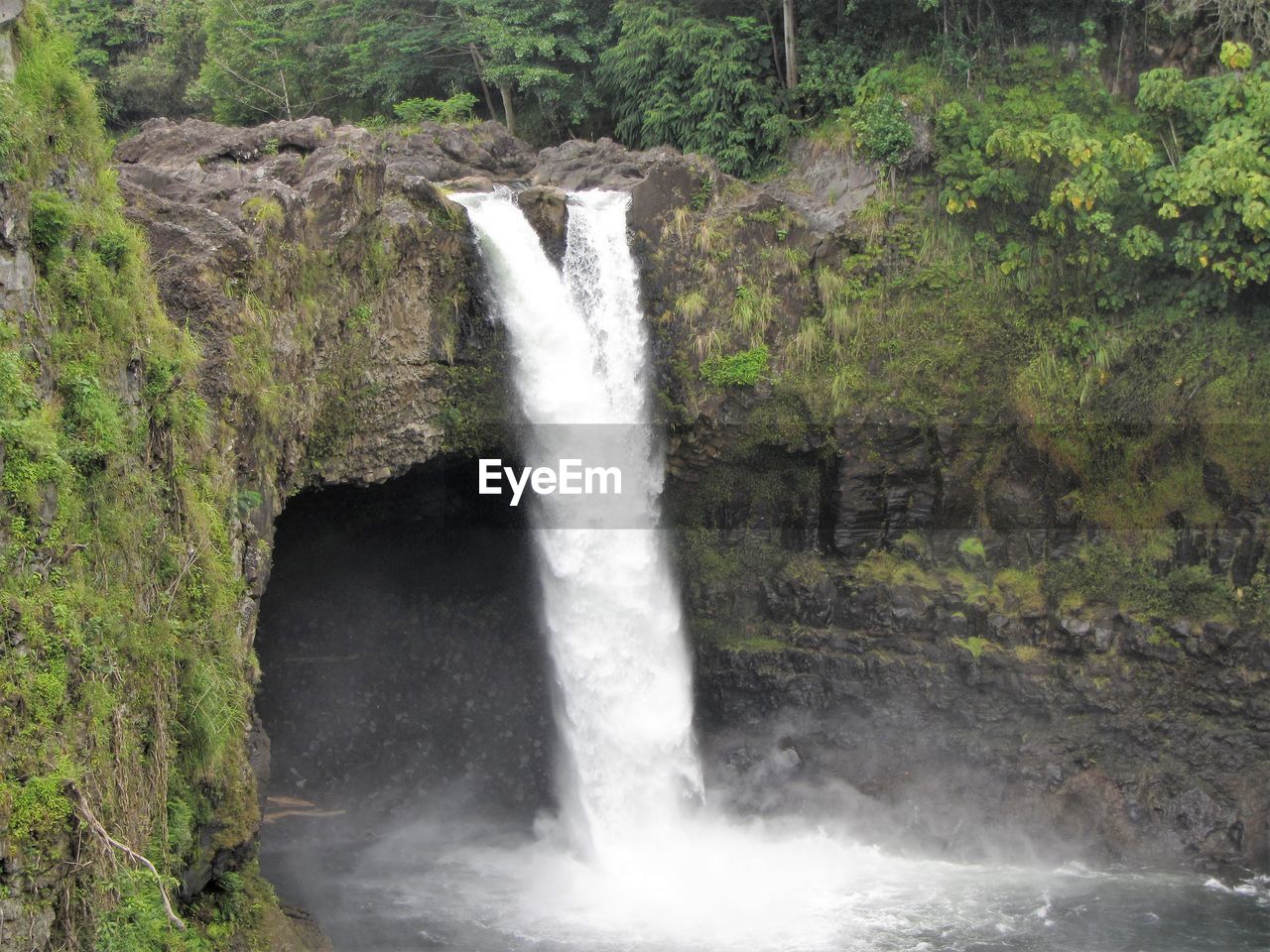 SCENIC VIEW OF WATERFALL