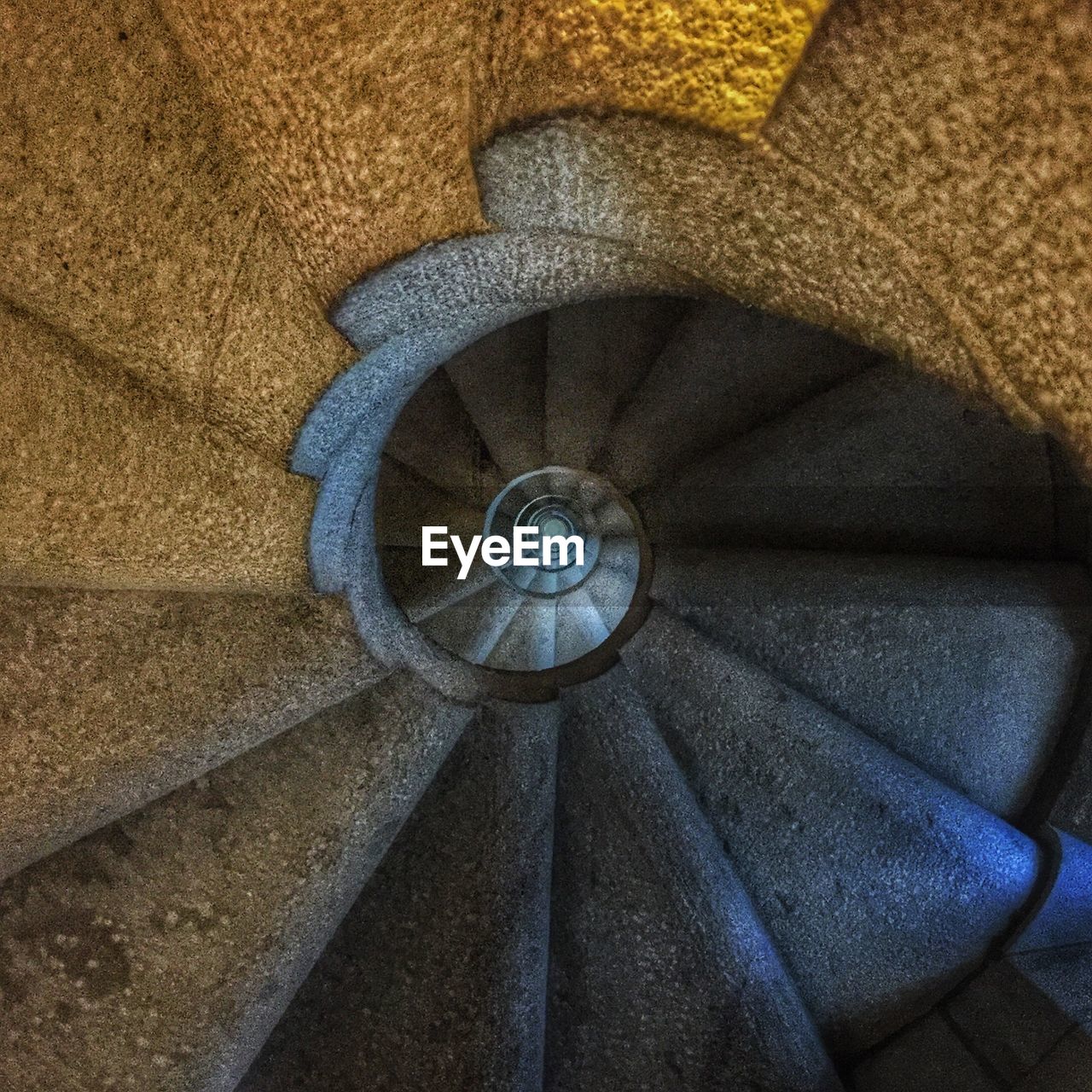 HIGH ANGLE VIEW OF SPIRAL STAIRCASE OF STAIRCASES