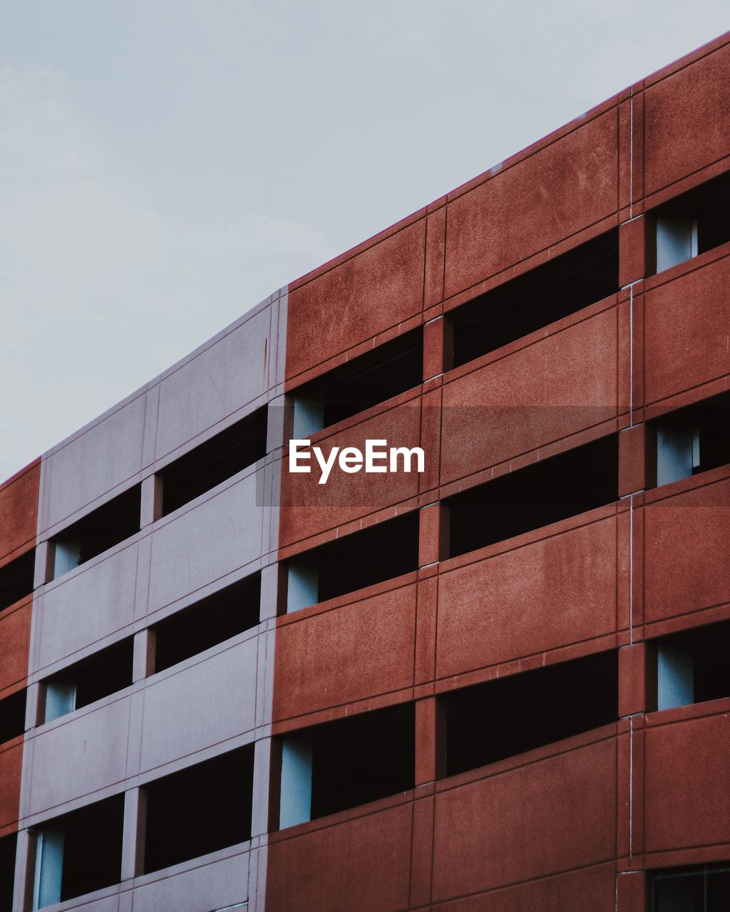 Low angle view of modern building against sky