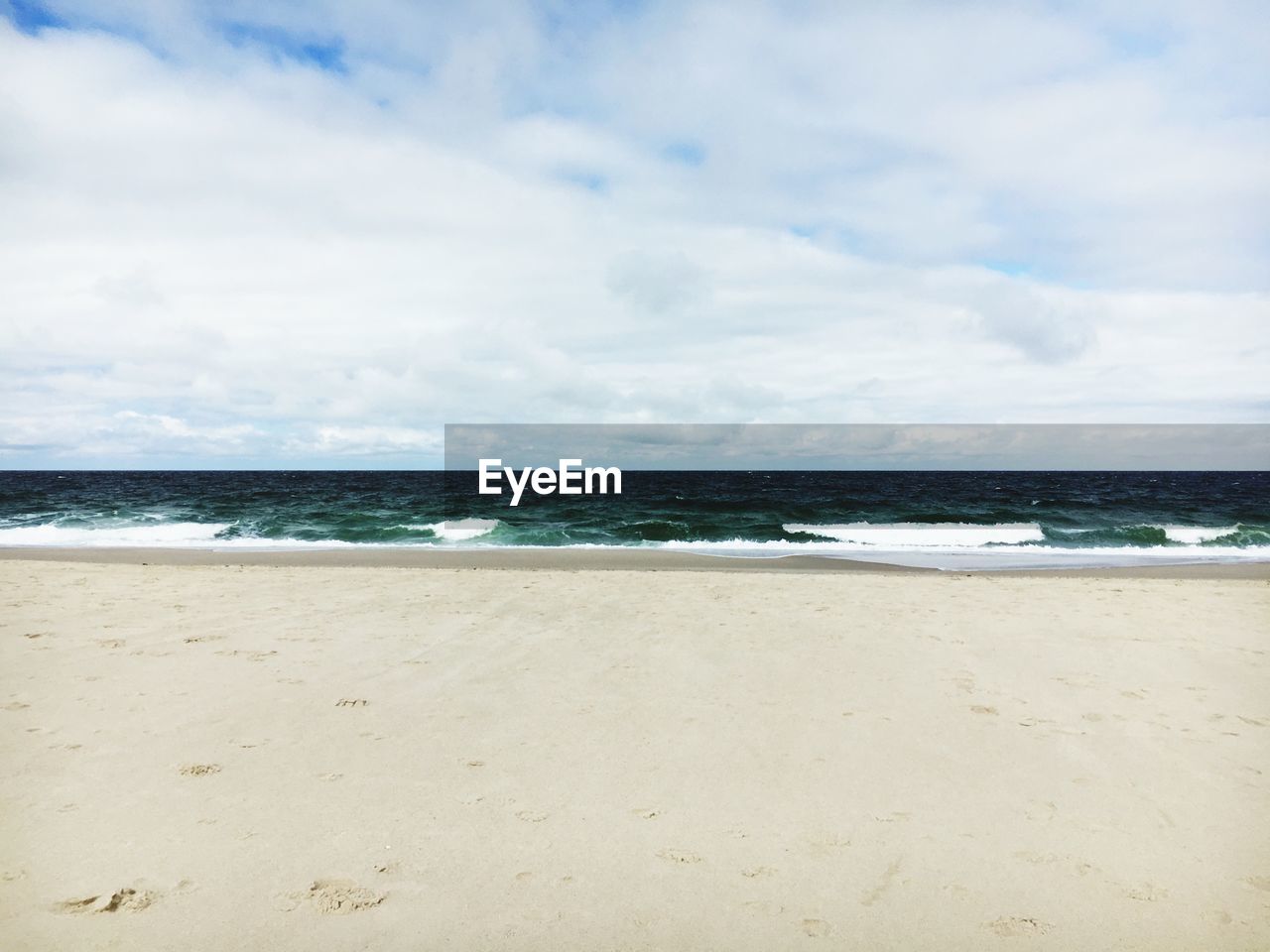 VIEW OF BEACH AGAINST SKY