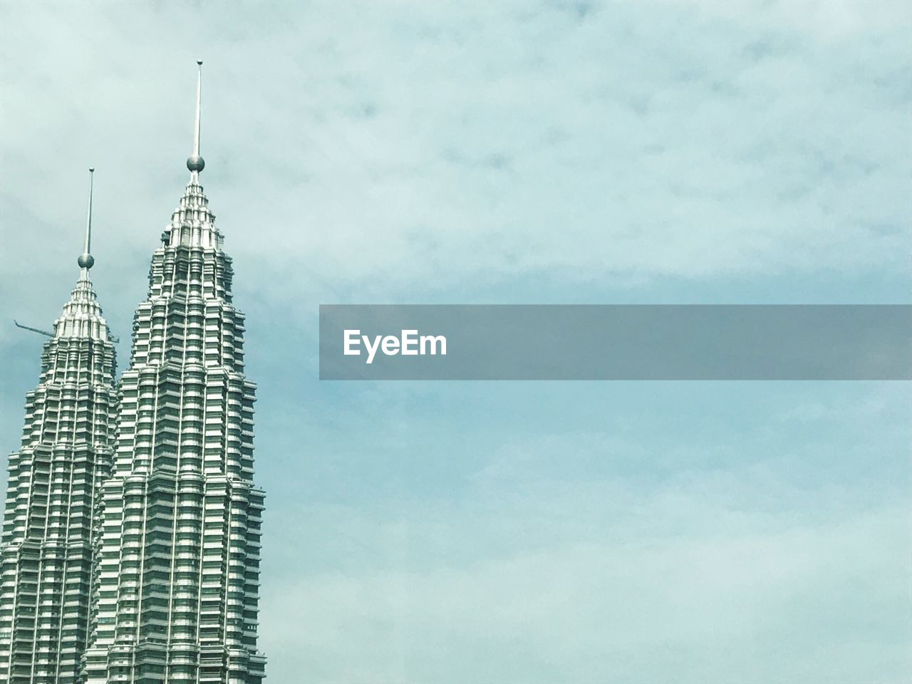 Low angle view of petronas towers against sky