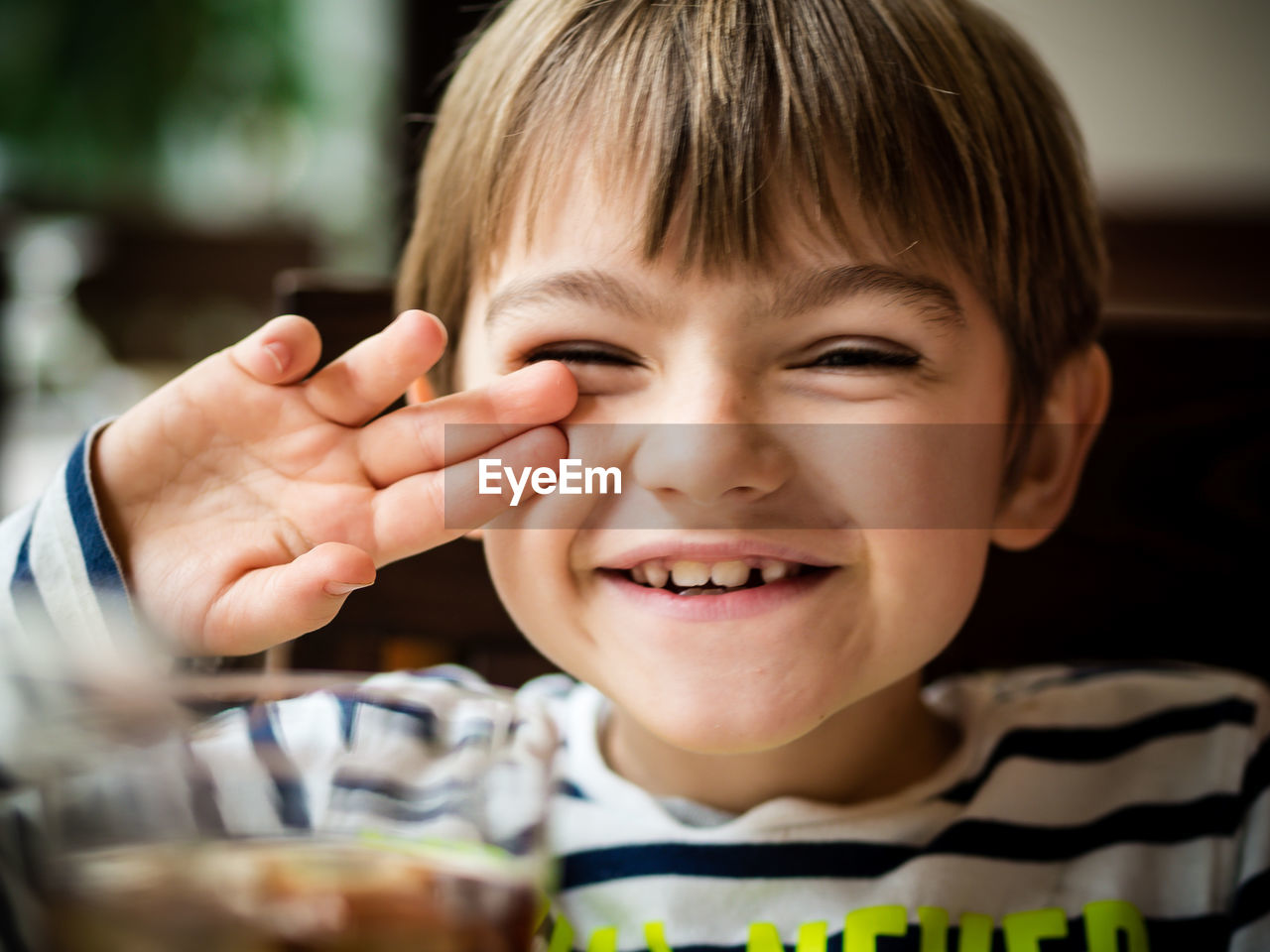 Close-up portrait of boy smiling