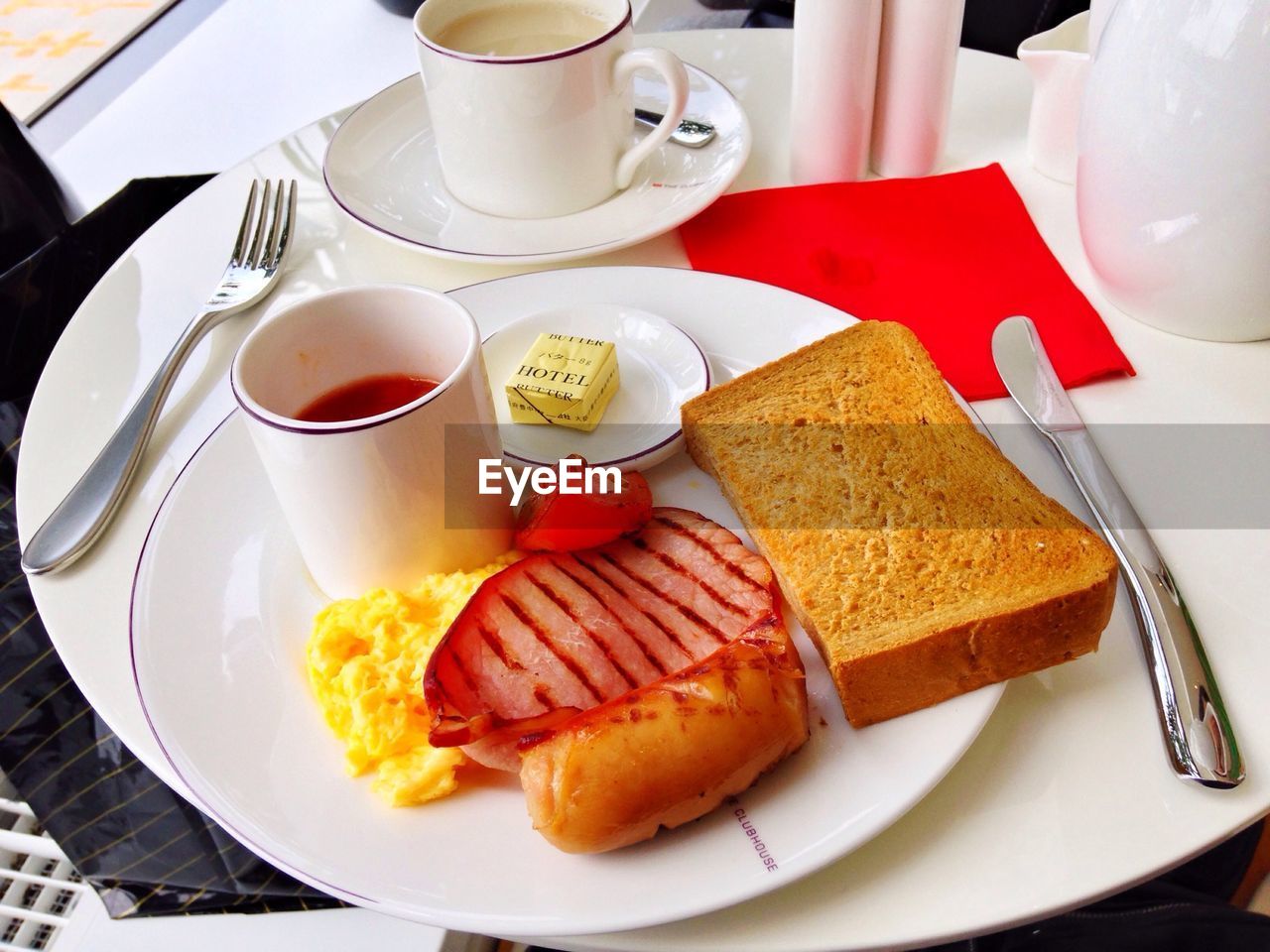 High angle view of english breakfast served with coffee in restaurant