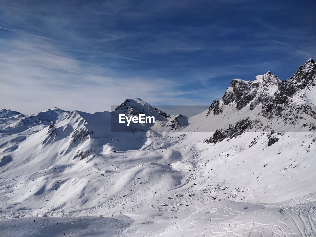 SNOW COVERED MOUNTAIN AGAINST SKY