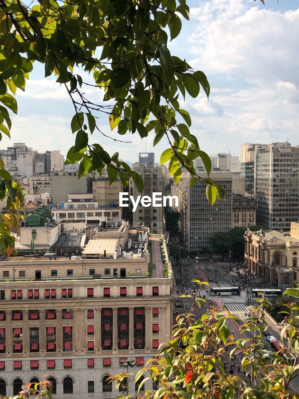 Buildings in city against sky