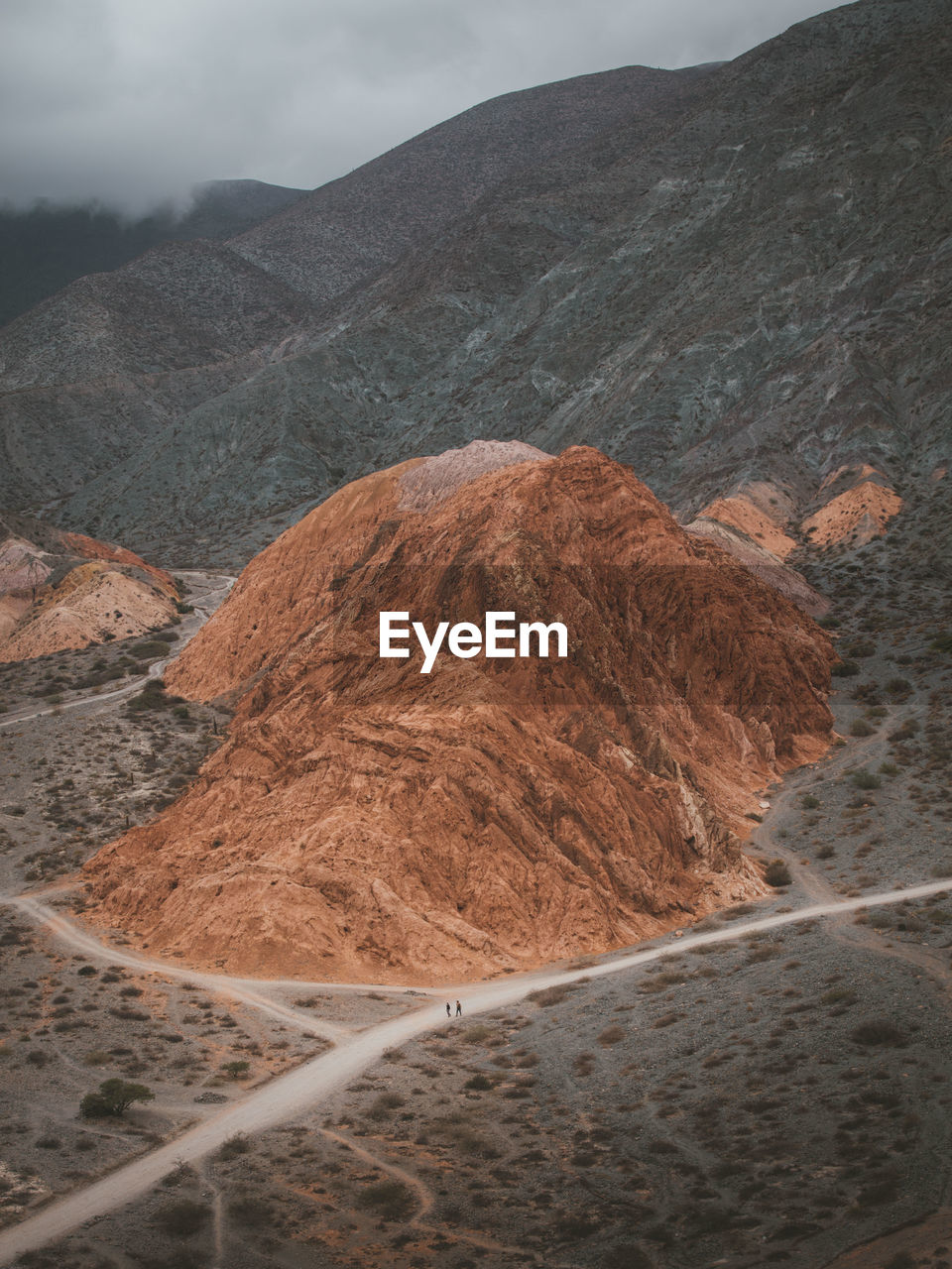 SCENIC VIEW OF ARID LANDSCAPE AND MOUNTAINS