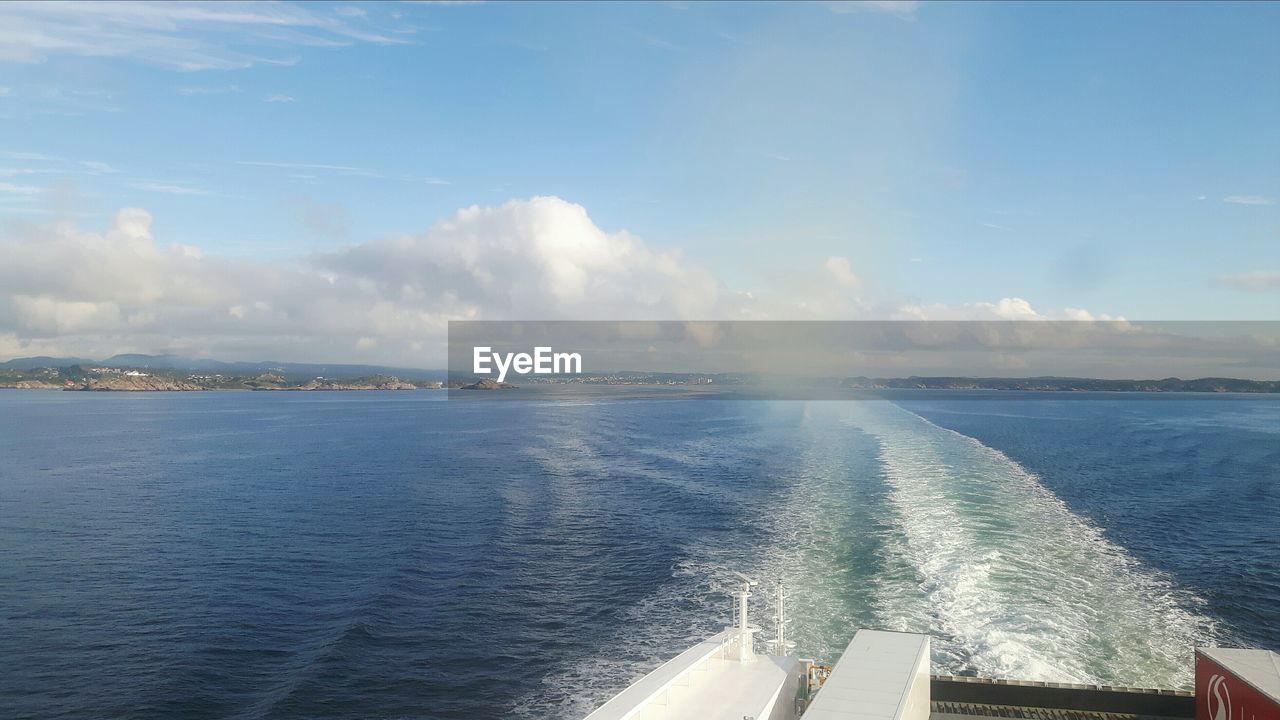 SCENIC VIEW OF SEASCAPE AGAINST CLOUDY SKY