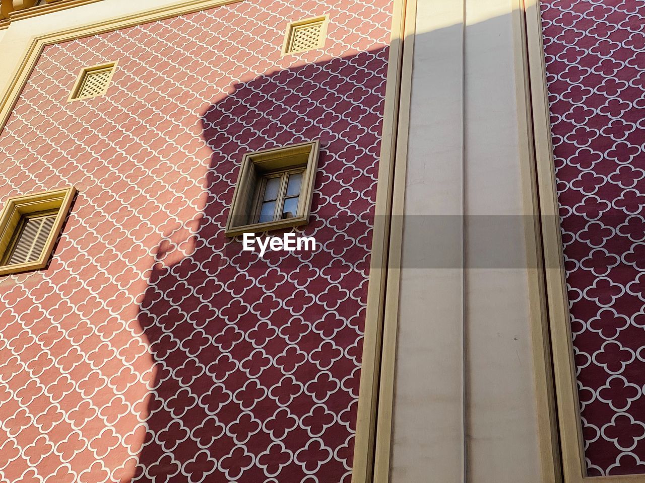 architecture, building exterior, built structure, building, window, wall, facade, brick, no people, house, day, residential district, window covering, outdoors, brickwork, interior design, low angle view, wall - building feature, sunlight, city