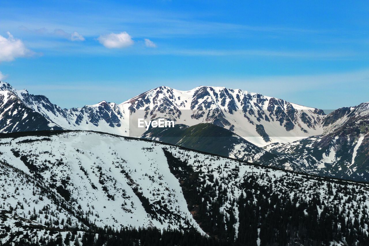 Grześ, Rakoń & Wołowiec. Polish Tatras during the end of winter. Mountain Winter Mountains Tatras Polish Tatra National Park Cold Temperature Snow Winter Sky Beauty In Nature Scenics - Nature Snowcapped Mountain Mountain Range Tranquil Scene Environment Tranquility Day Nature Cloud - Sky Non-urban Scene No People Landscape Idyllic Outdoors Mountain Peak Formation